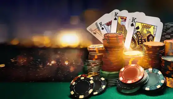 Casino cards and chips on green table